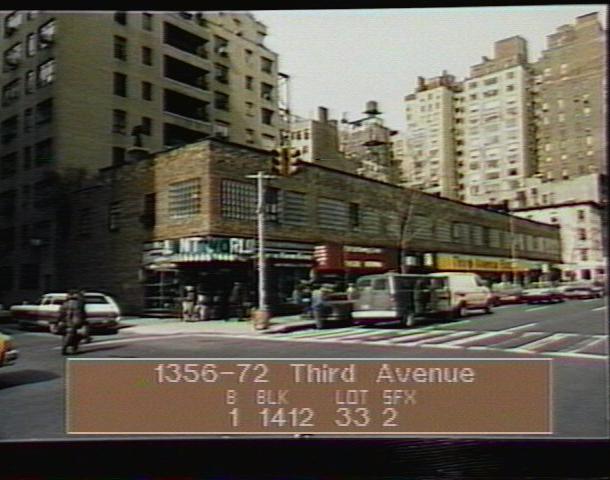 Low-resolution colour tax photograph of a two-story shopfront row running up Third Avenue under awnings, with a taller terraced apartment house rising behind it at the left, and a caption bar reading 1356-72 Third Avenue, block 1412, lot 33.
